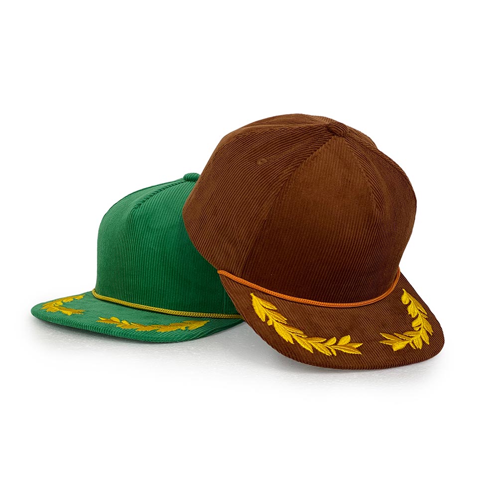 Green and brown 5 panel corduroy snapback cap with decorative elements on a white background